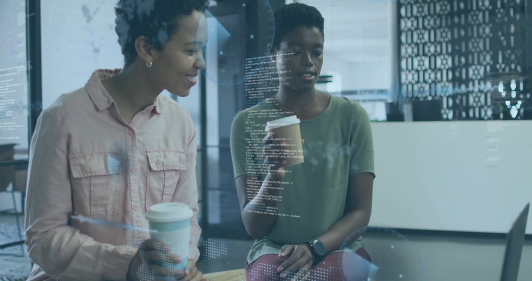 Tech Coworkers Collaborating on Code at Modern Office Lounge