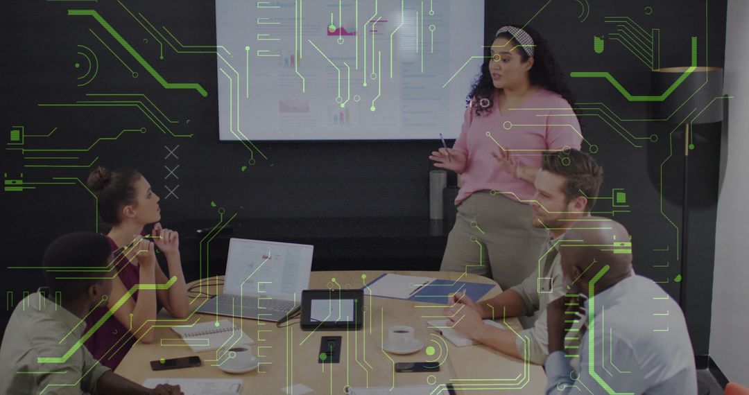 Team Collaborating with Technology at Business Presentation Meeting