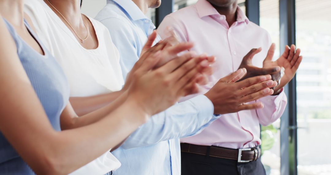 Diverse Business Professionals Applauding in Office Environment