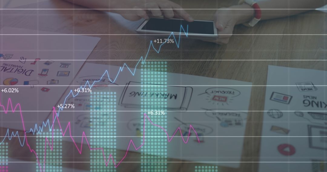 Hands Using Tablet with Overlay of Financial Graphs and Data
