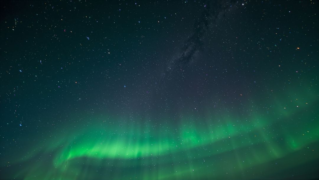 Emerald Aurora Curtains Sweeping Starry Polar Sky Northern Lights with Milky Way