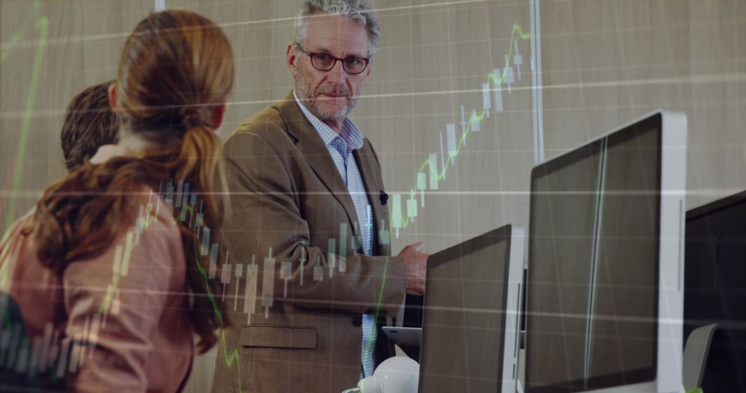 Financial Analysts Discussing Market Trends in Modern Office