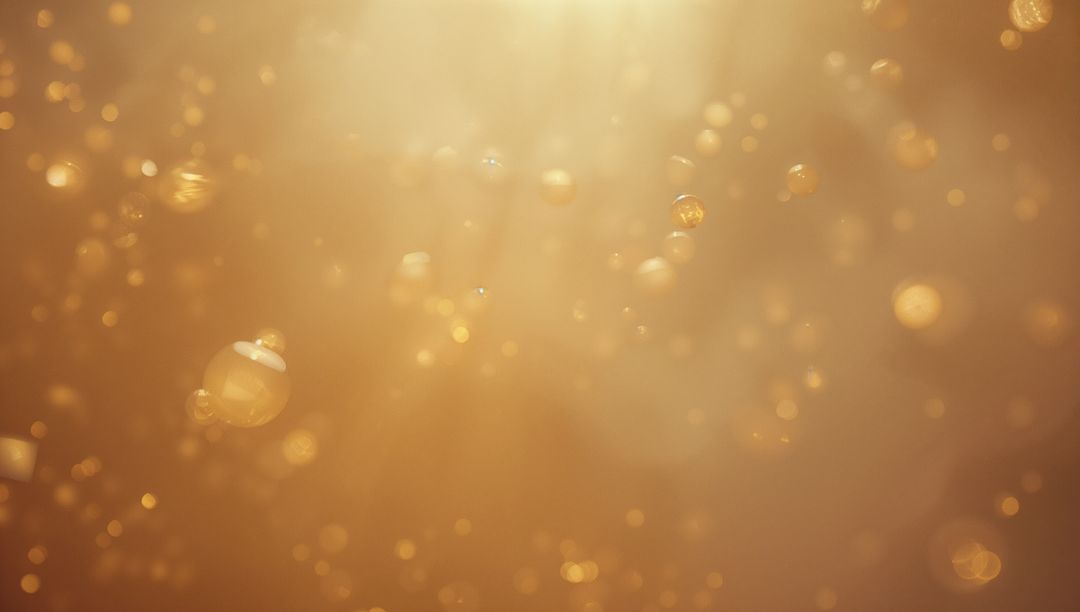Serene Golden Glow with Floating Bokeh Orbs