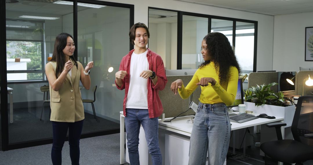 Diverse Team Engaged in Fun Office Activity for Team Building