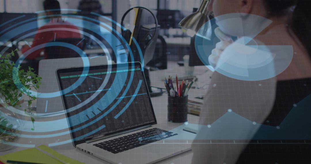 Woman Reviewing Code on Laptop with High-Tech Data Overlays