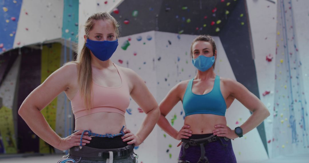 Women Rock Climbing Indoors with Masks During Pandemic