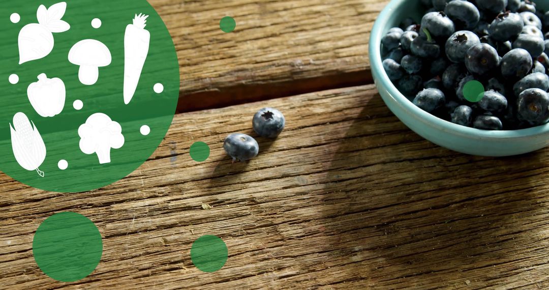 Blueberries Bowl on Rustic Wooden Table with Vegetable Icons
