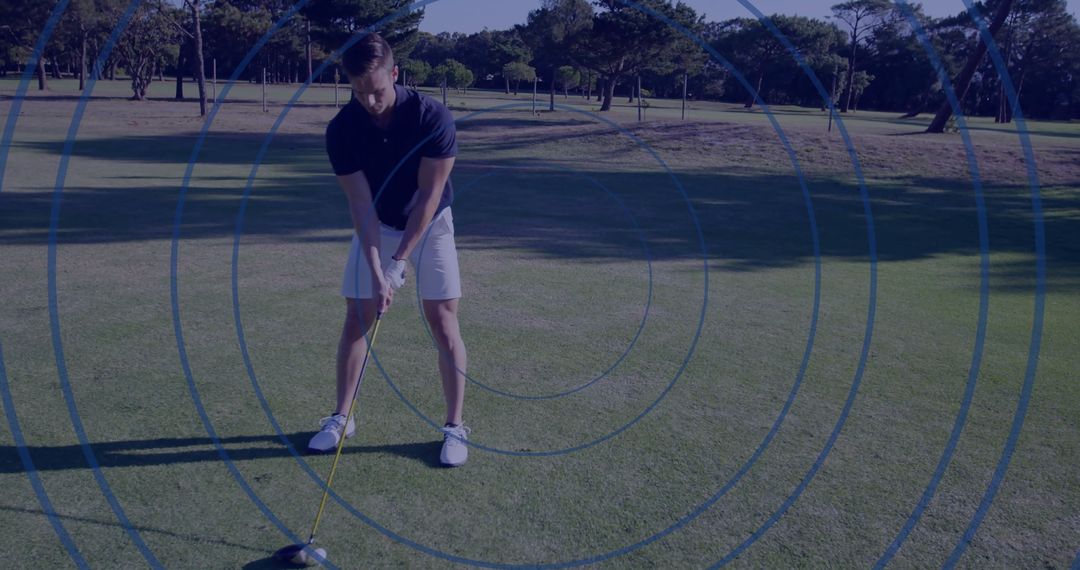 Golfer Preparing Swing on Lush Fairway