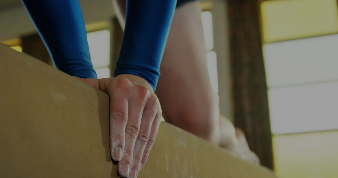 Gymnast Focusing on Balance Beam during Training Session