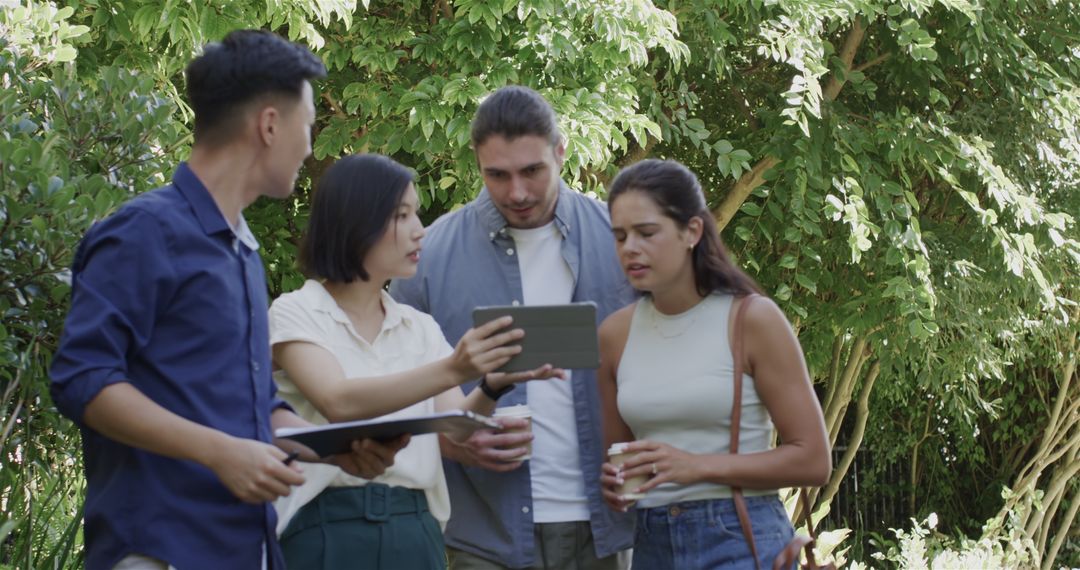 Friends Collaborating on Projects Outdoors in Natural Setting