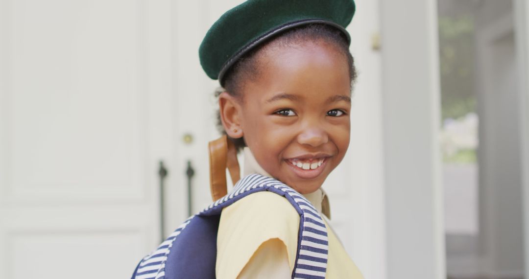 Image of happy african american girl in scout costume delivering packages - Free Images, Stock Photos and Pictures on Pikwizard.com