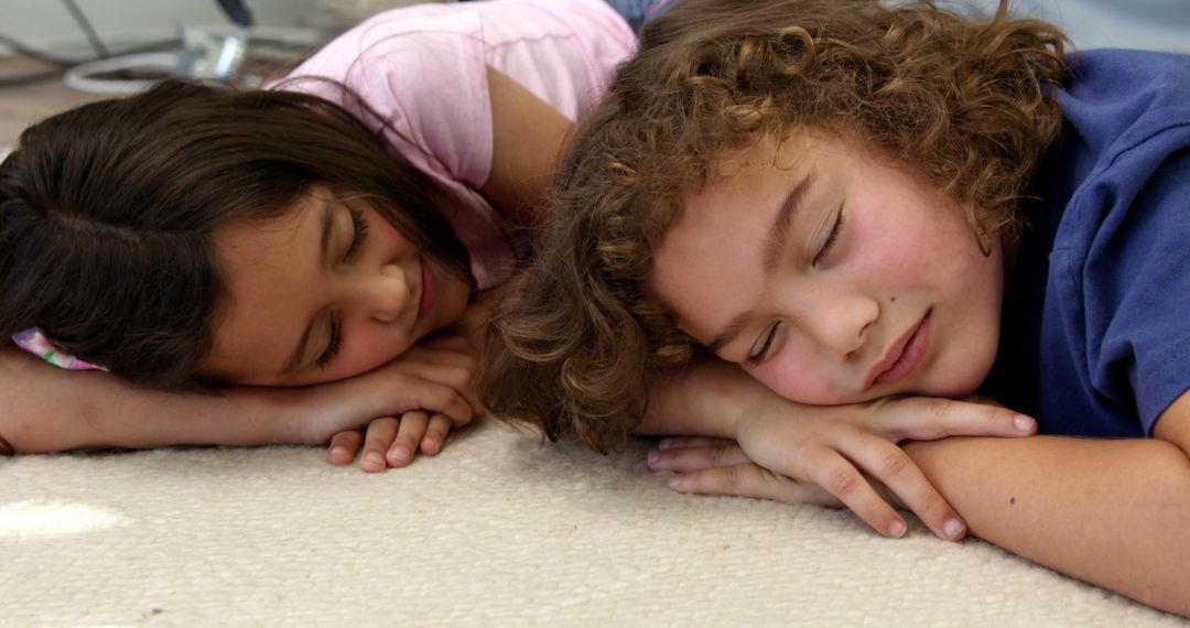 Children Taking a Nap on Carpet, Peaceful Sleep, Resting Together - Free Images, Stock Photos and Pictures on Pikwizard.com