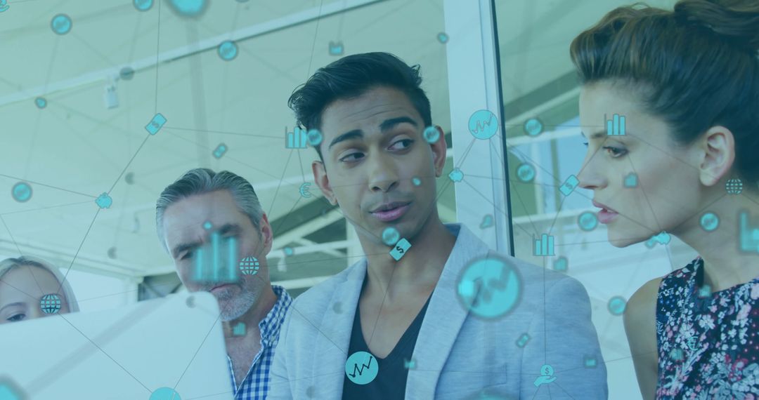 Multicultural Team Collaborating on Innovative Project in Modern Office