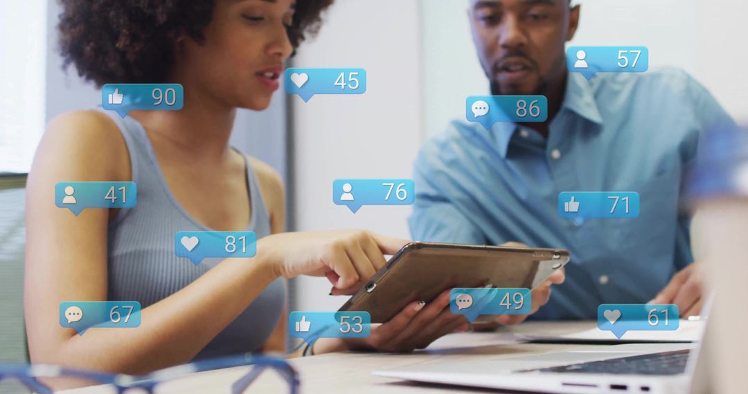 Business Professionals Analyzing Data on Tablet with Social Metrics Overlays