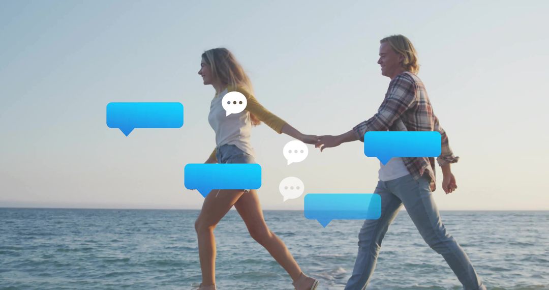 Couple Enjoying Walk on Beach Holding Hands with Chat Icons