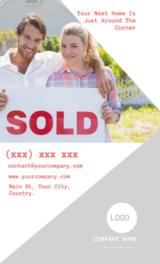 Smiling Couple Holding Sold Sign in Real Estate Promotion