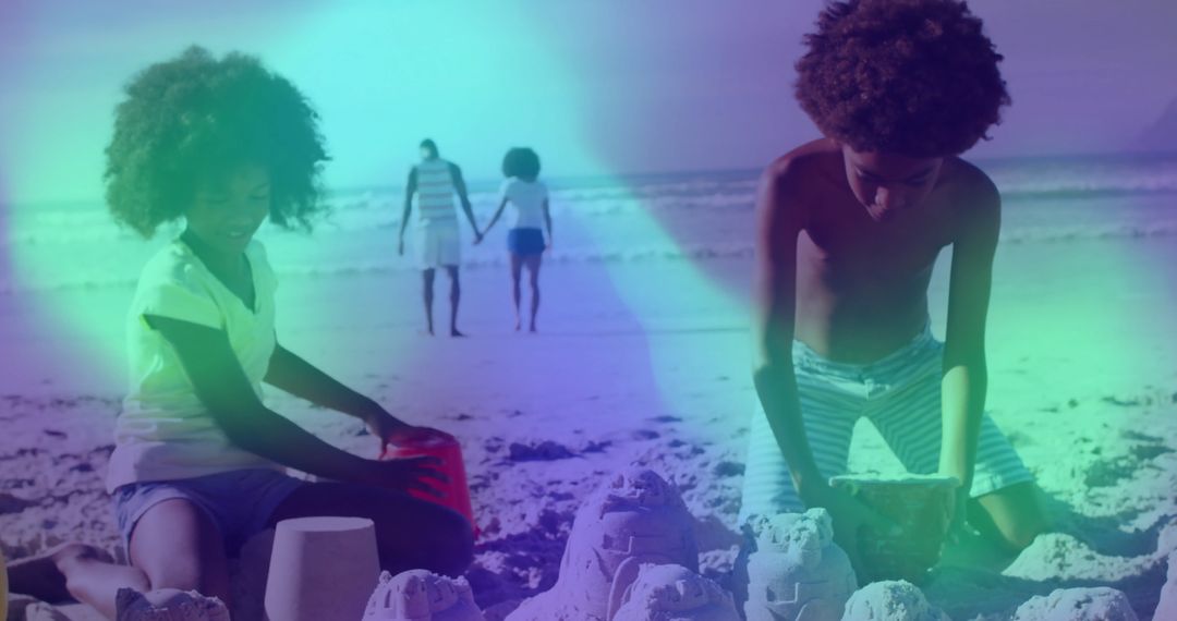 Children Building Sandcastles on Beach with Walking Parents