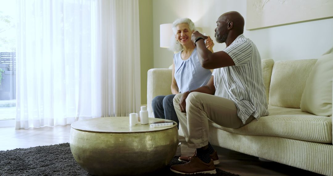 Senior Couple Organizing Medications at Home