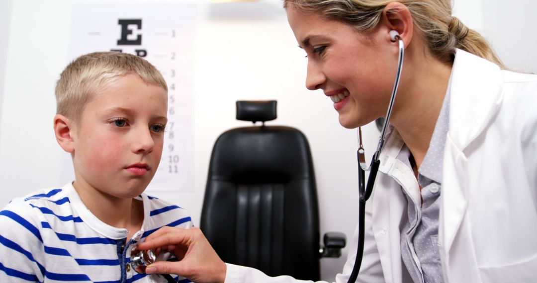 Pediatrician Listening to Child's Heart with Stethoscope During Checkup - Free Images, Stock Photos and Pictures on Pikwizard.com