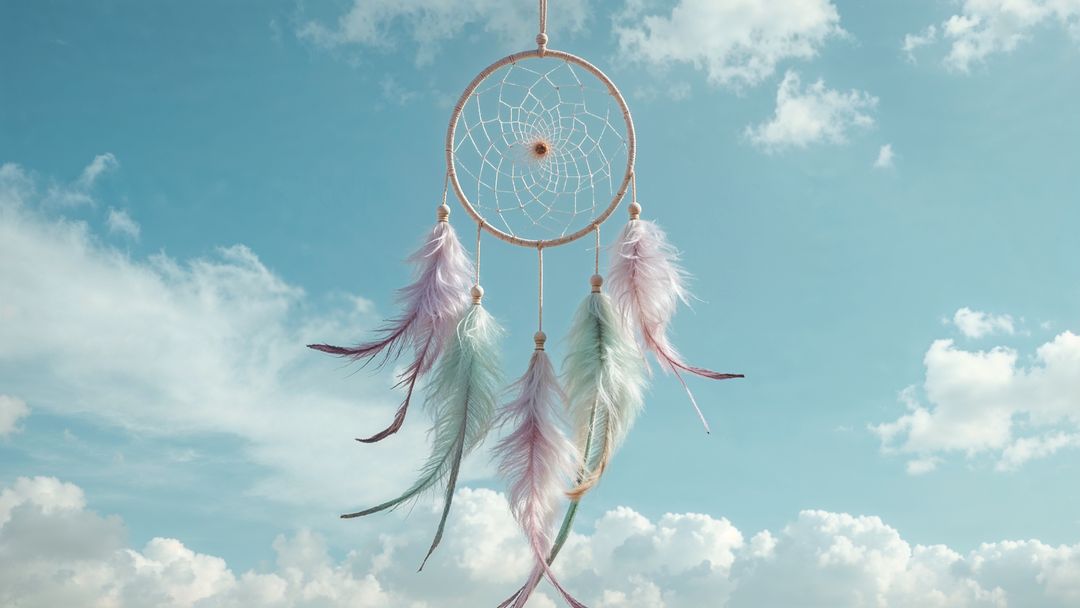 Bohemian Dreamcatcher Swaying Against Turquoise Sky with Pastel Feathers