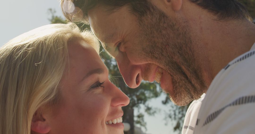 Happy Couple Smiling at Each Other in Love