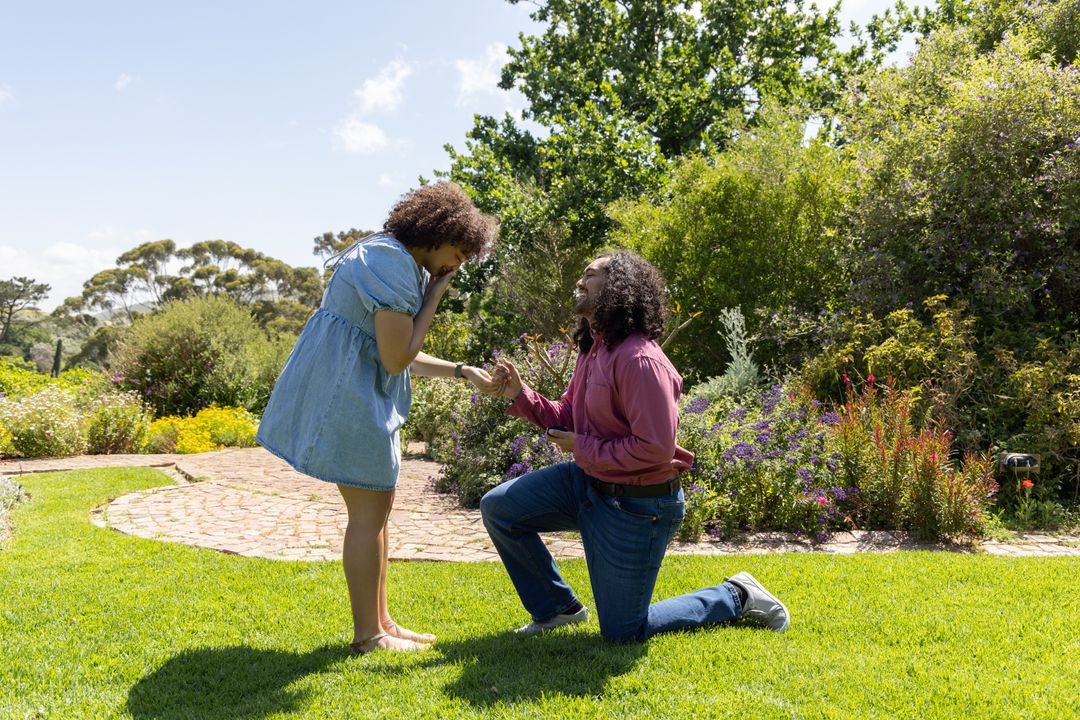 Joyful Proposal in Sunlit Garden, Expression of Love