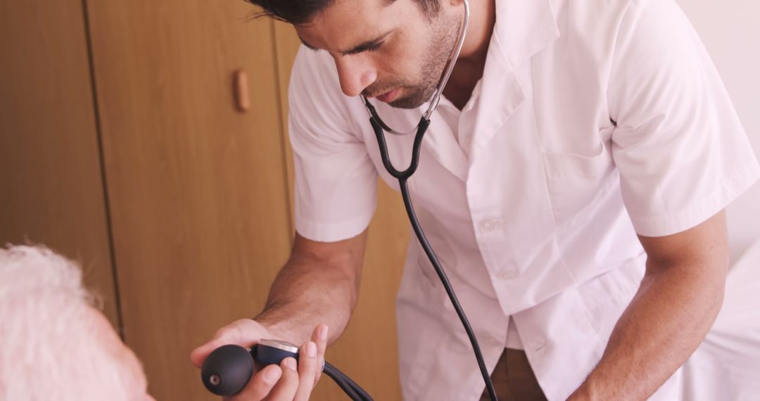 Doctor Caring for Elderly Patient During Medical Checkup - Free Images, Stock Photos and Pictures on Pikwizard.com