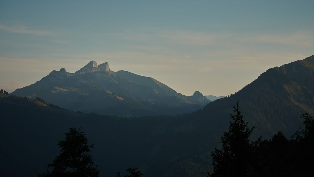 Silhouette of Mountain Peaks at Dusk - Free Images, Stock Photos and Pictures on Pikwizard.com