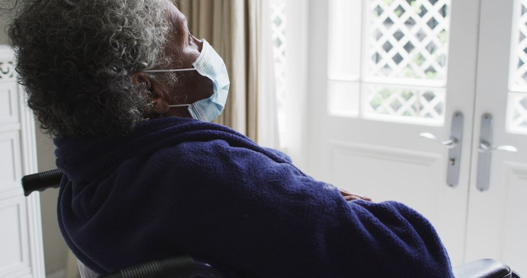 Elderly Woman in Wheelchair Wearing Mask at Home During Lockdown - Free Images, Stock Photos and Pictures on Pikwizard.com