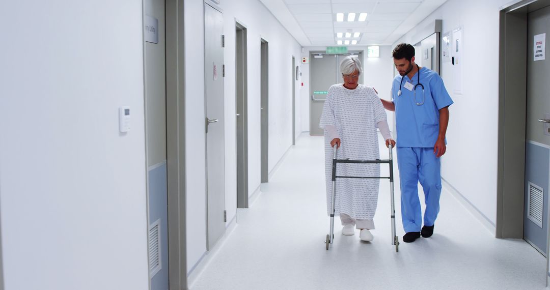 Nurse Assisting Elderly Patient with Walker in Hospital Corridor - Free Images, Stock Photos and Pictures on Pikwizard.com