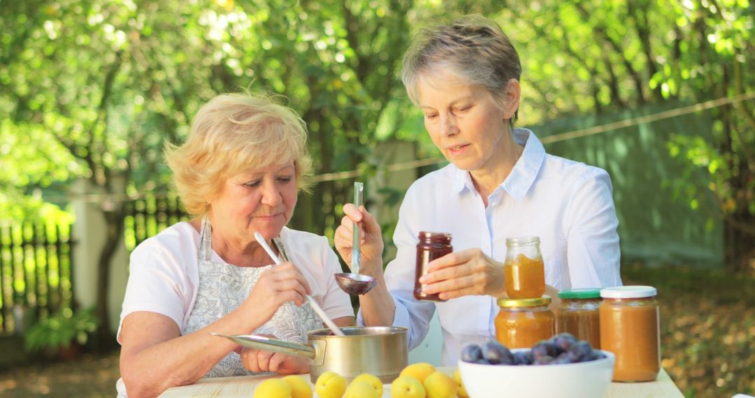 Senior Women Making Homemade Jam Together - Free Images, Stock Photos and Pictures on Pikwizard.com