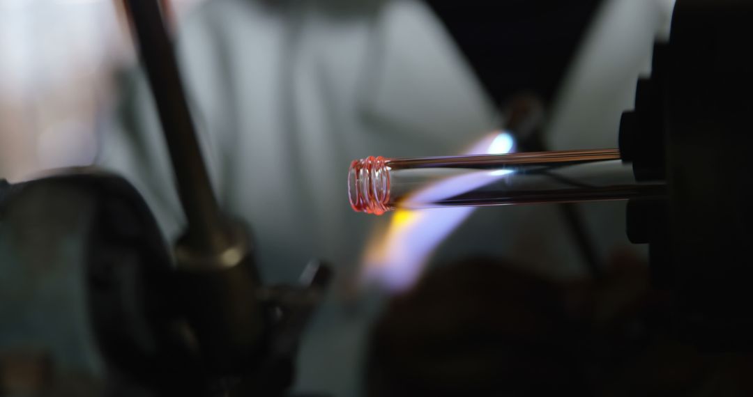 Craftsman Heating Glass Tube in Factory Workshop