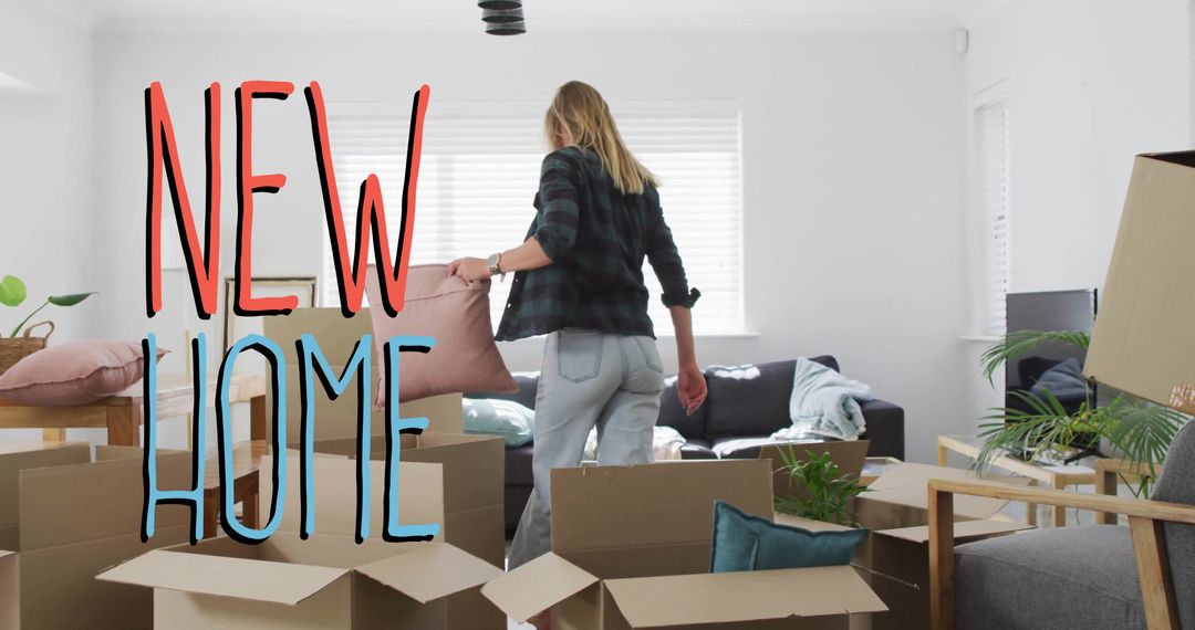 Woman Unpacking Boxes in Moving New Home