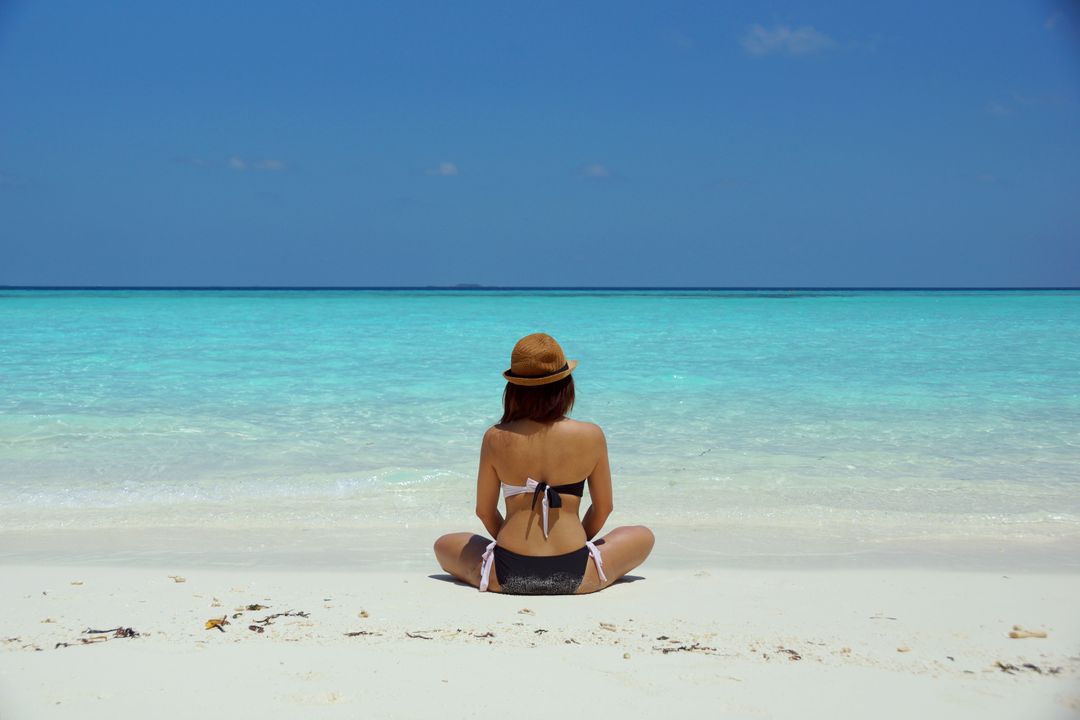 Woman Relaxing on Tropical Beach in Summer - Free Images, Stock Photos and Pictures on Pikwizard.com