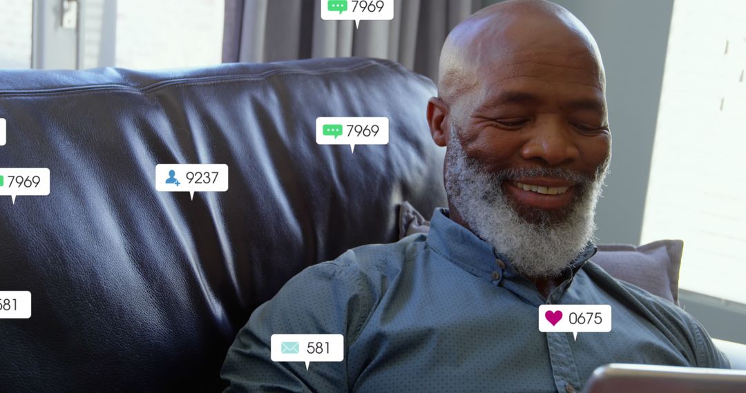 Senior Man Engaged with Social Media Notifications on Tablet
