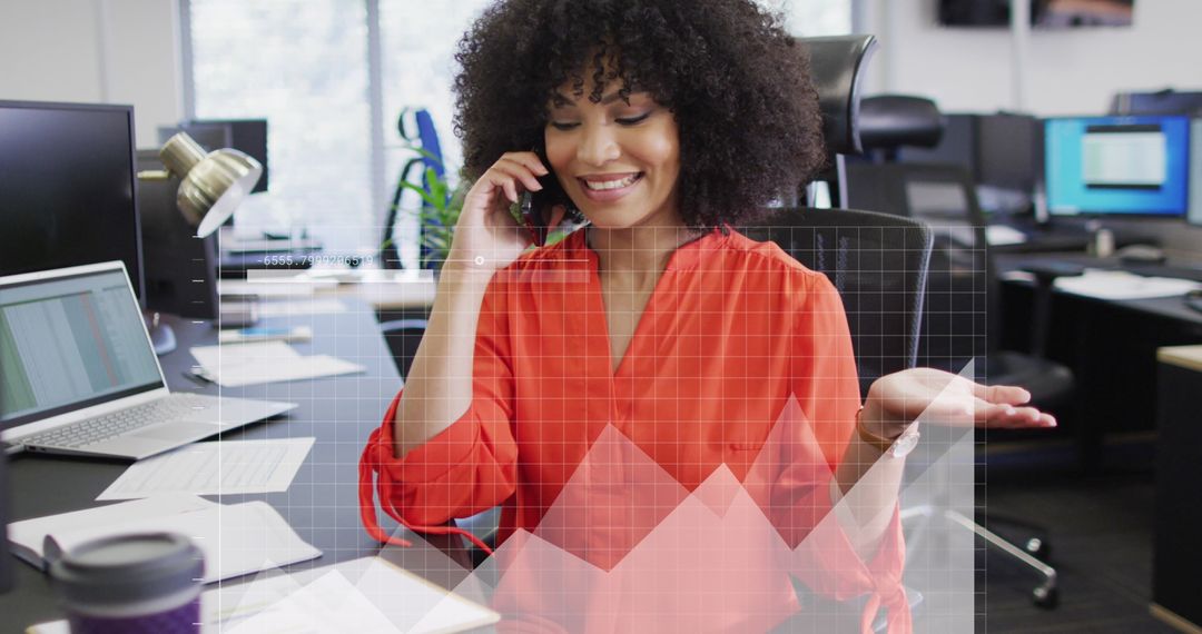 Businesswoman Discussing Financial Data on Phone in Office