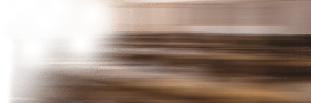 Blurred Office Desk with Transparent Computer Equipment