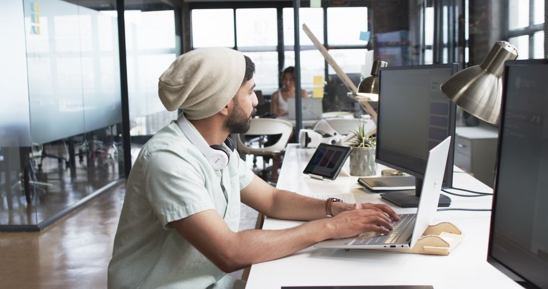 Young Innovative Developer Engaged in Creative Work Environment