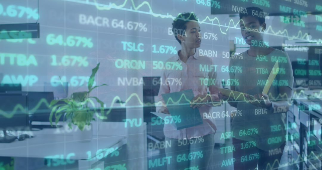 Business Professionals Analyzing Digital Stock Data in Office