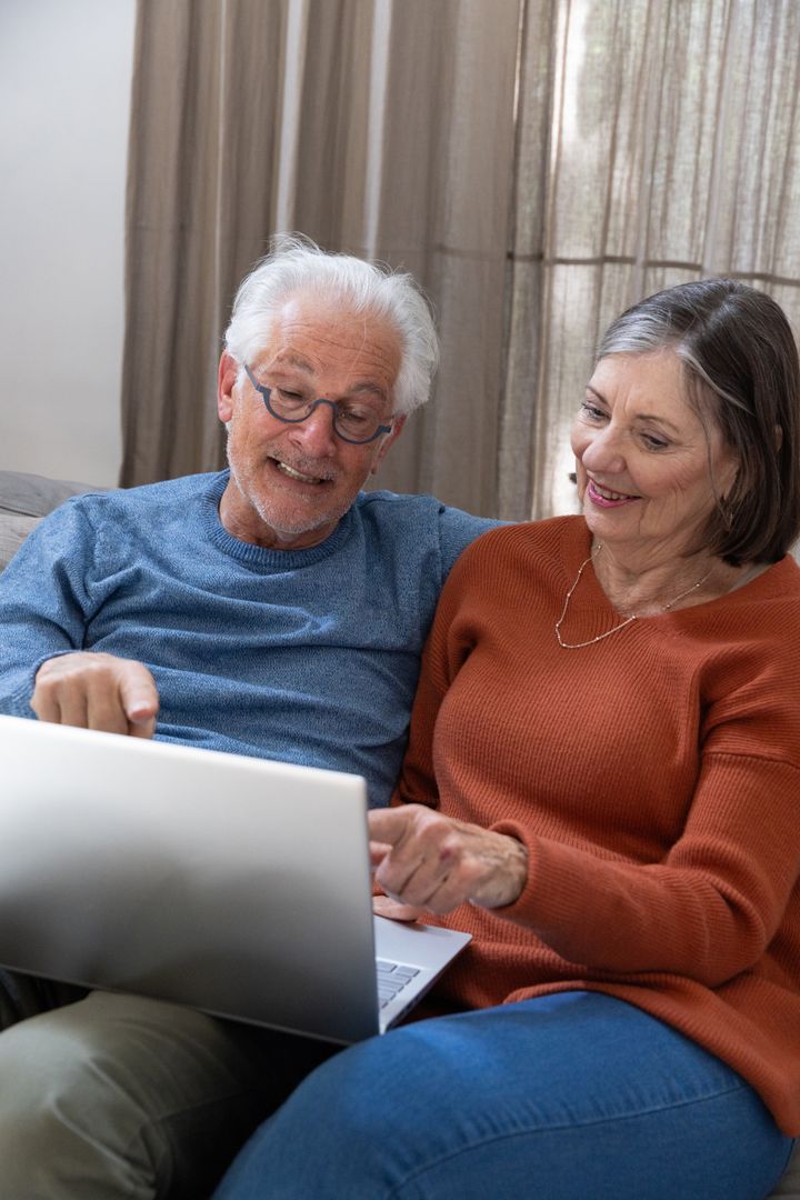 Senior Couple Relaxing Home Lifestyle Using Laptop Together