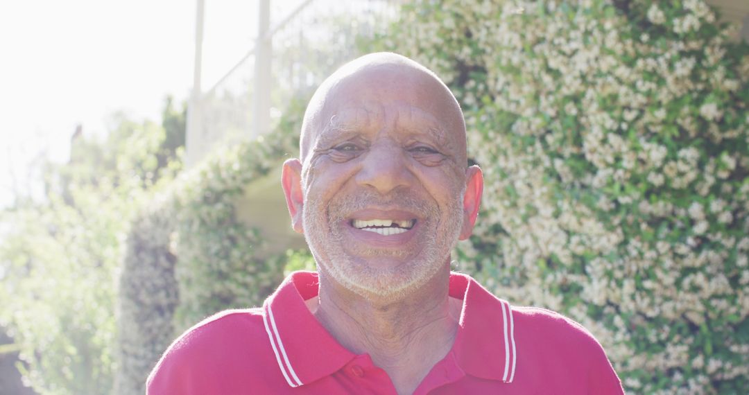 Elderly Man Smiling Outdoors on Sunny Day - Free Images, Stock Photos and Pictures on Pikwizard.com