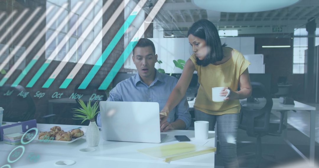 Diverse Business Colleagues Analyzing Data in Office