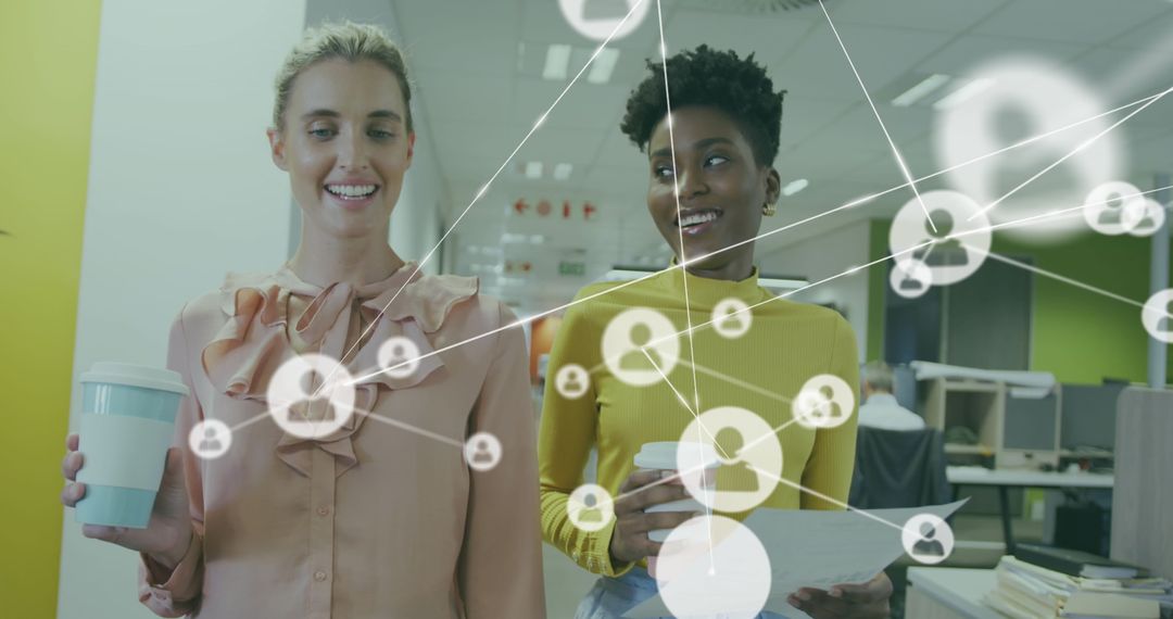 Diverse Female Coworkers Collaborating in Modern Office with Digital Connections