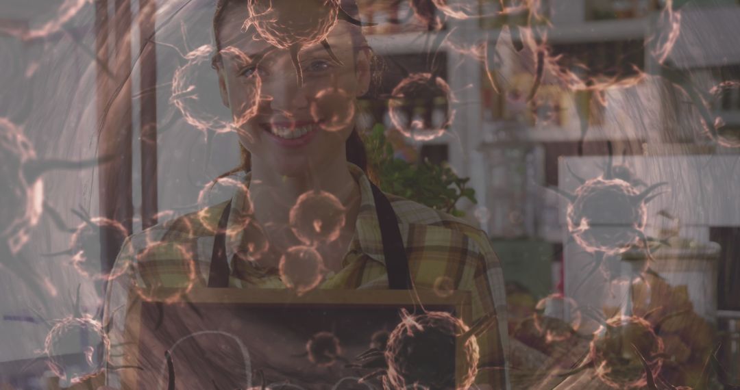 Smiling Woman in Apron with Chalkboard Surrounded by Abstract Particles