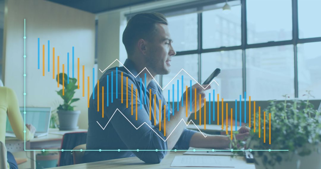 Caucasian Businessman Analyzing Financial Graphs at Office Desk