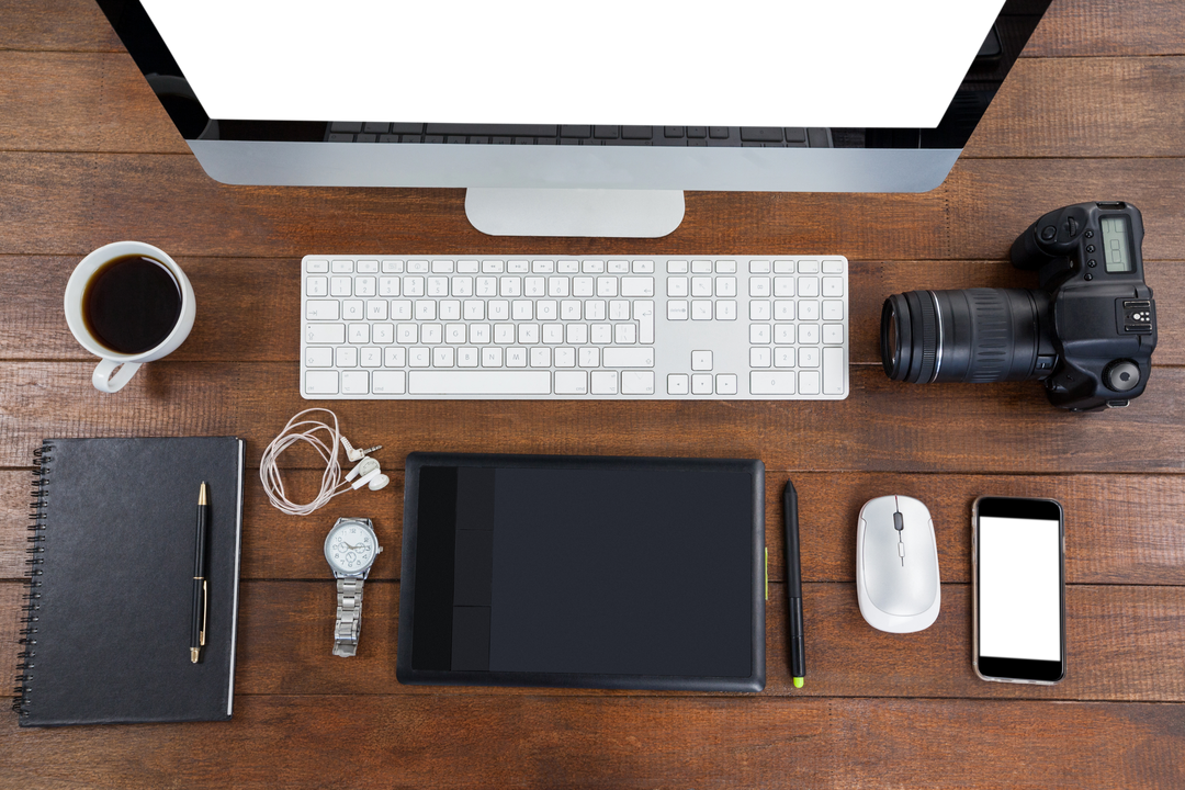 Organized Office Desk with Wireless Devices on Wooden Surface - Download Free Stock Images Pikwizard.com