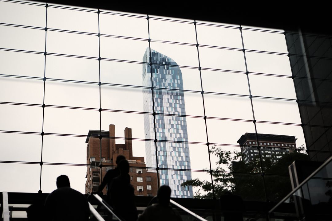 View of Modern Skyscraper through Glass Walls of Building - Free Images, Stock Photos and Pictures on Pikwizard.com