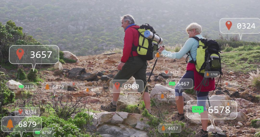 Senior Couple Hiking in the Mountains with Data Overlays