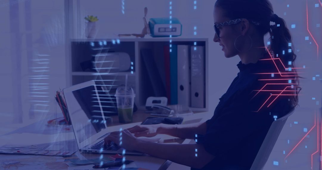 Woman Analyzing Data on Laptop with Futuristic Graphics Overlay