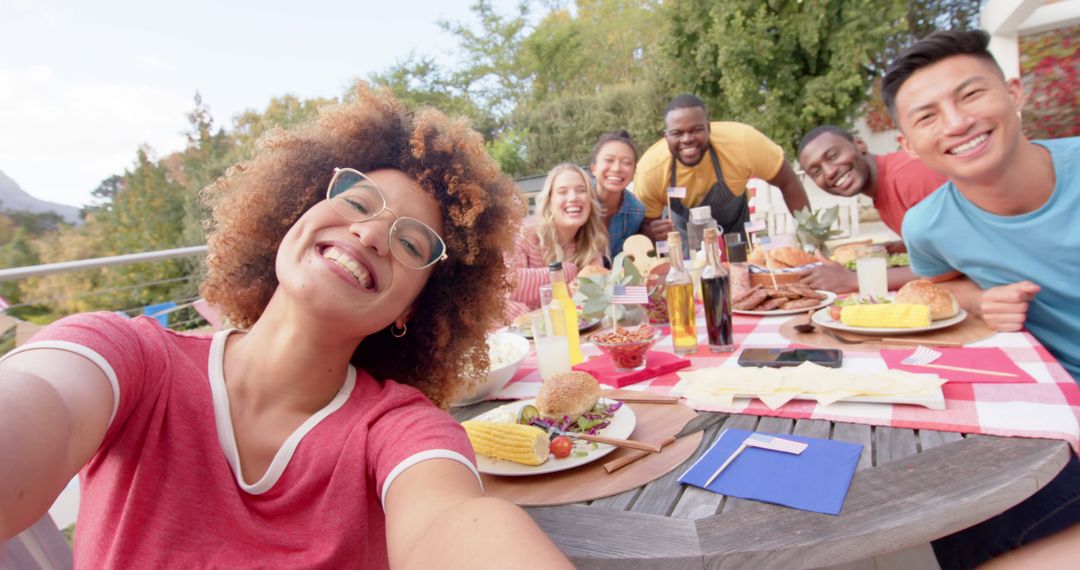 Diverse Friends Enjoying Outdoor Picnic and Taking Selfie Together - Free Images, Stock Photos and Pictures on Pikwizard.com